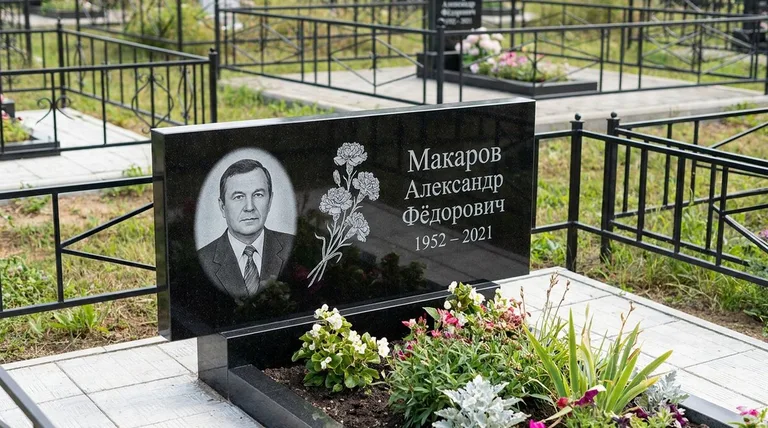 Памятник с гравировкой гвоздик — выполненная работа «Макаров» в Воронеже