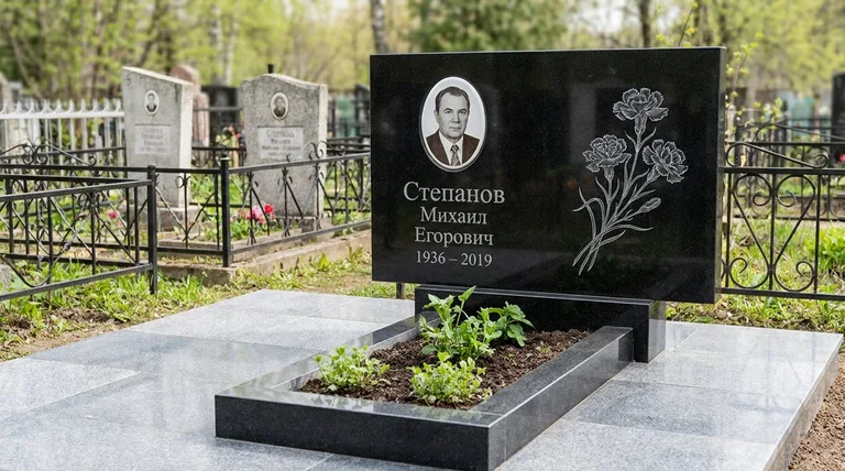 Памятник с гравировкой гвоздик — выполненная работа «Степанов» в Воронеже