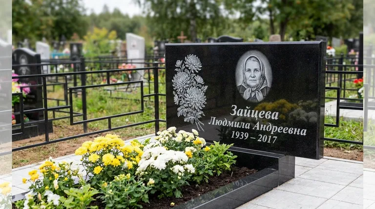 Памятник с гравировкой хризантем — выполненная работа «Зайцева» в Воронеже
