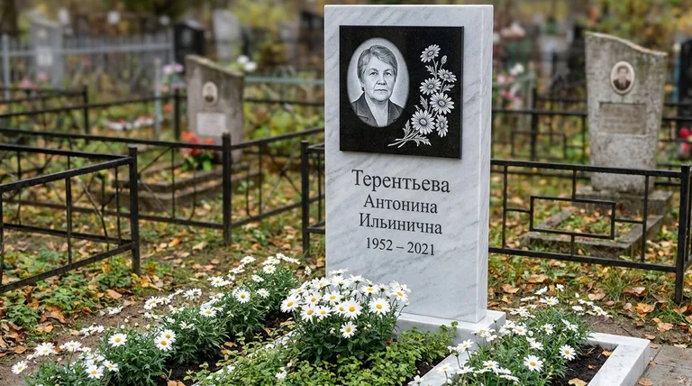 Памятник с гравировкой ромашек — выполненная работа «Терентьева» в Воронеже