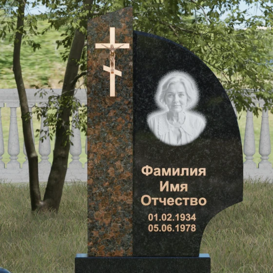 Памятник — крыло с распятием и шарами, гранит Габбро-диабаз, в Якутске