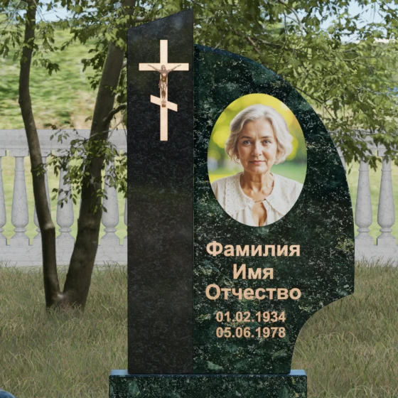 Памятник — крыло с распятием и шарами, гранит Балтик грин, в Якутске